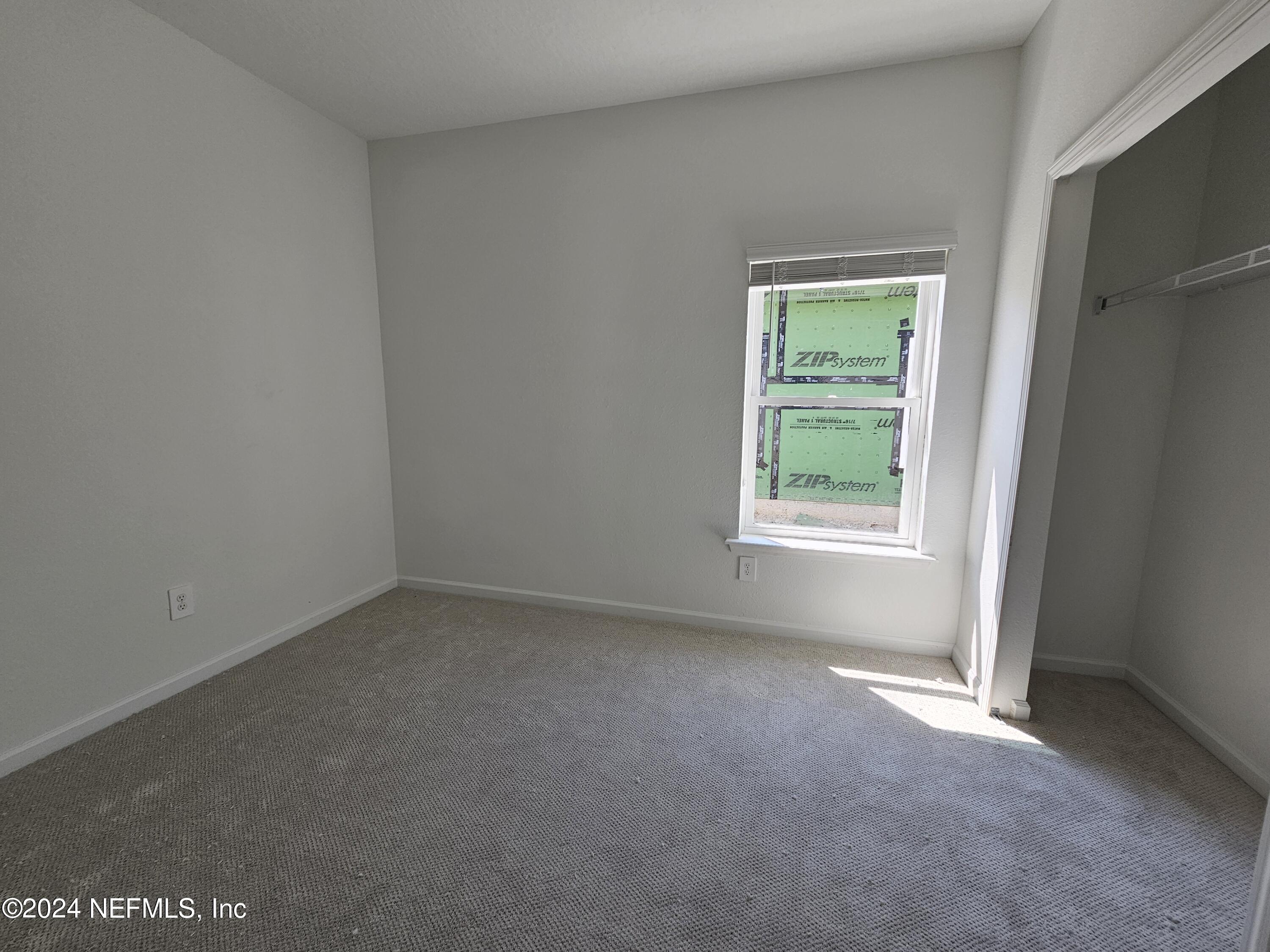 75232 Plumbago Trace Yulee, FL 32097 - Photo 14 of 79 an empty room with a window