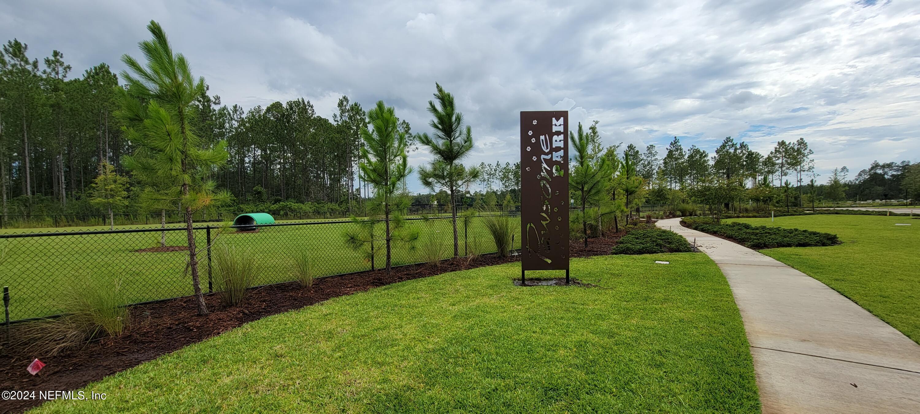 75232 Plumbago Trace Yulee, FL 32097 - Photo 76 of 79 a view of a garden with a slide