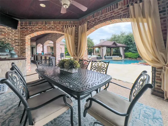a view of a livingroom with furniture and window