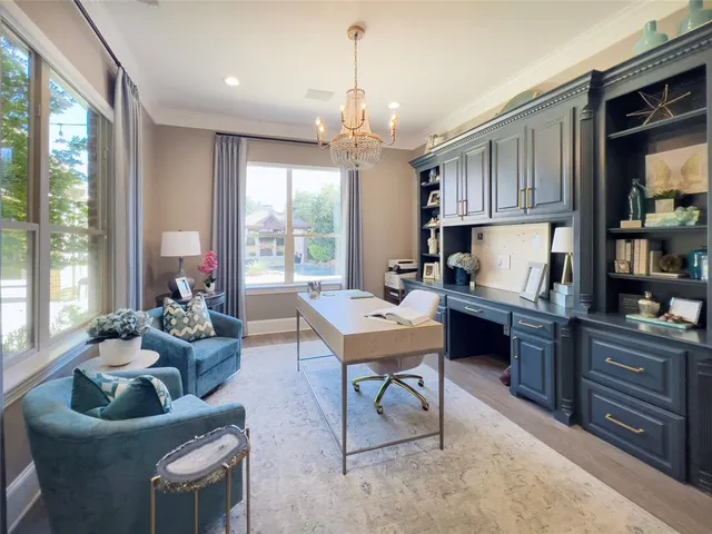 a very nice looking living room with a large window