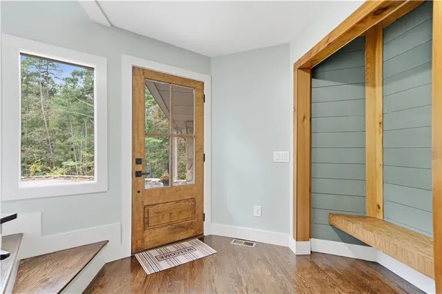 a view of staircase with white walls and stairs