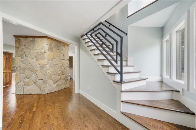 a view of entryway with wooden floor