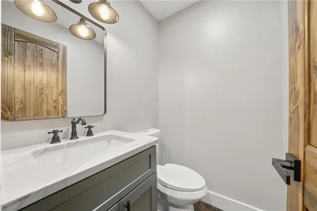 a balcony with wooden floor and fence