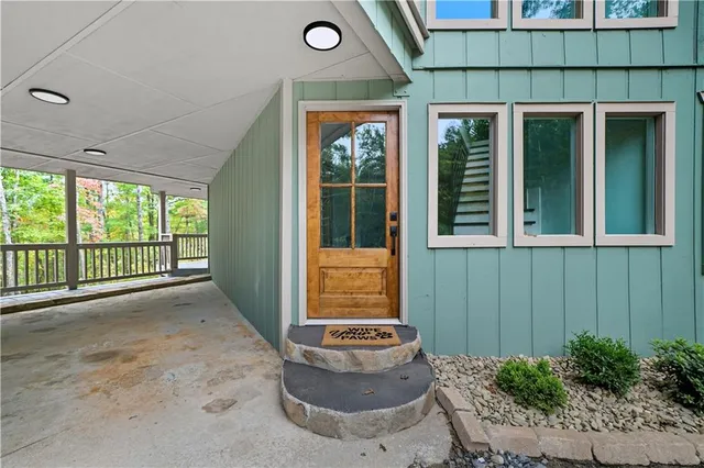 a view of an empty room and window