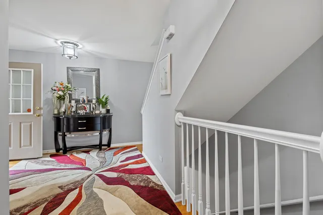 a bedroom with a bed and a mirror