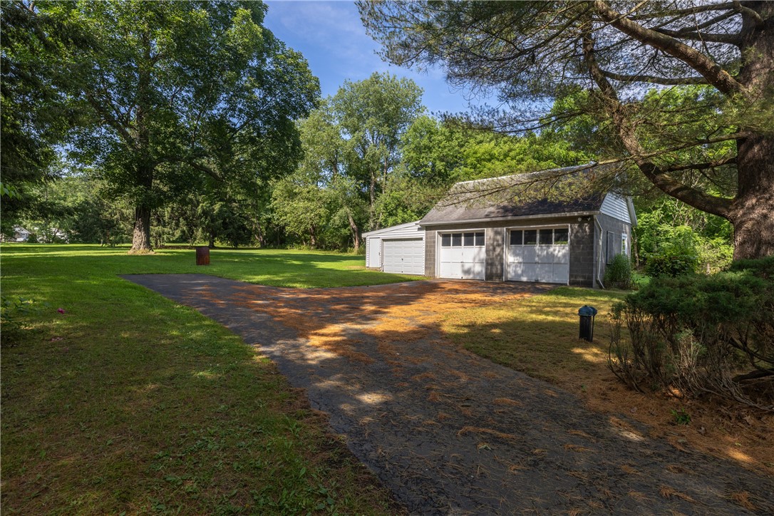1716 Scott Road Lindley, NY 14858 - Photo 3 of 43 3 Bay cinderblock garage holds all of your outside