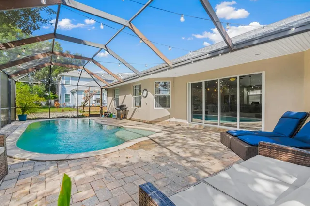a view of a porch and garden