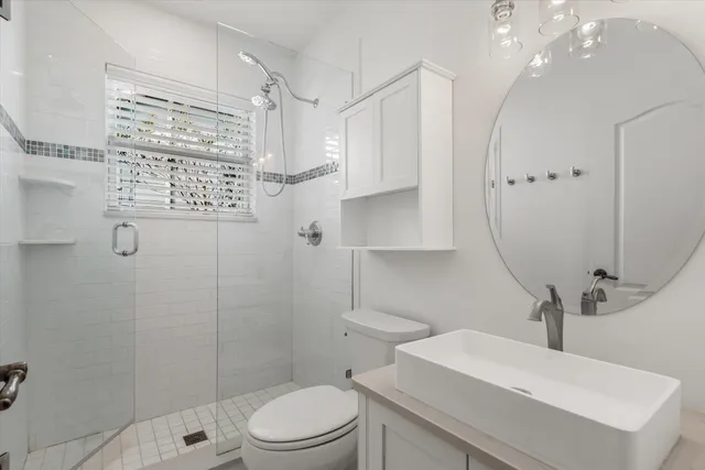 an empty room with cabinet and wooden floor