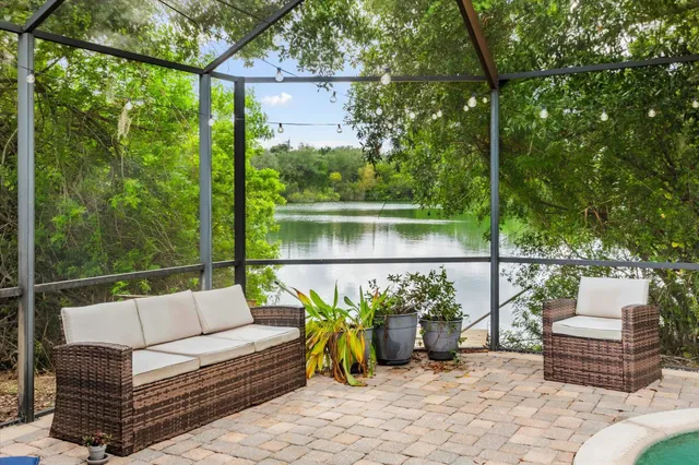 a view of a lake with a yard