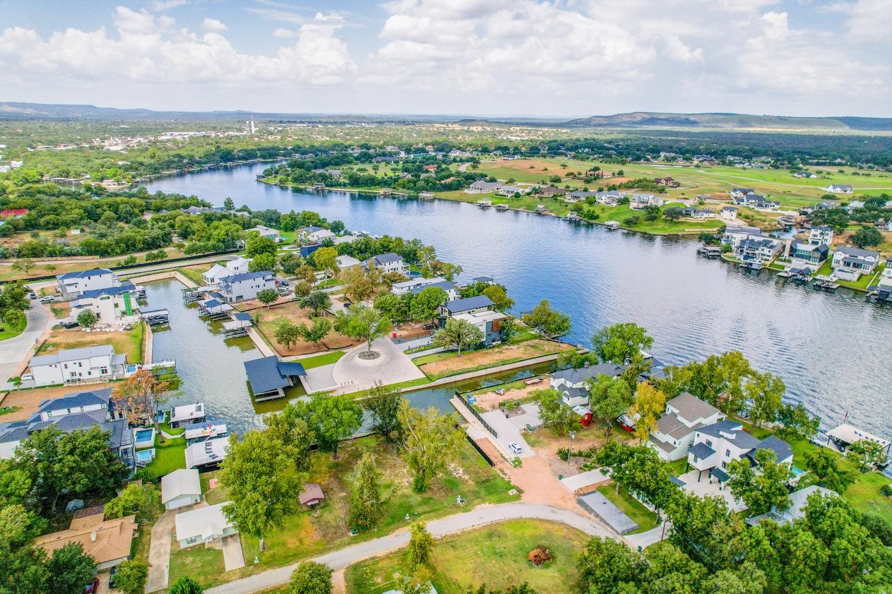 Lot 38 Harris Loop Kingsland, TX 78639 - Photo 5 of 7 an aerial view of residential houses with outdoor space and lake view