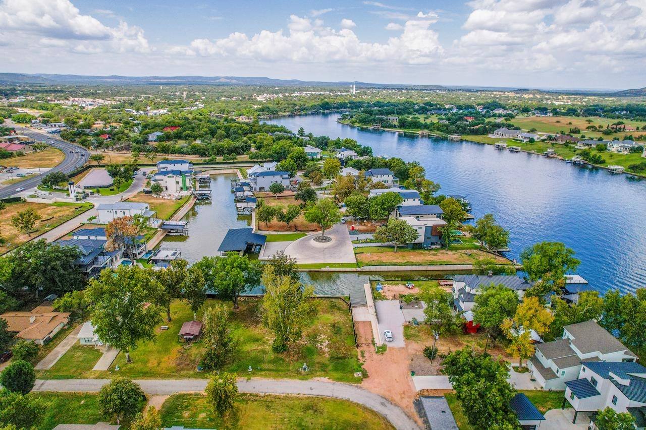 Lot 38 Harris Loop Kingsland, TX 78639 - Photo 6 of 7 a view of a lake with a city