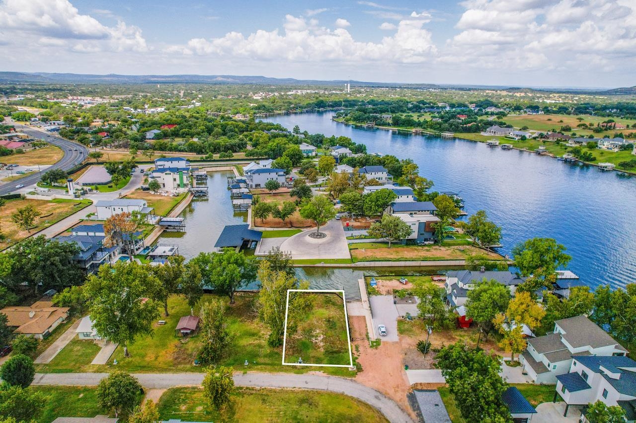 Lot 38 Harris Loop Kingsland, TX 78639 - Photo 7 of 7 an aerial view of a house with a lake view