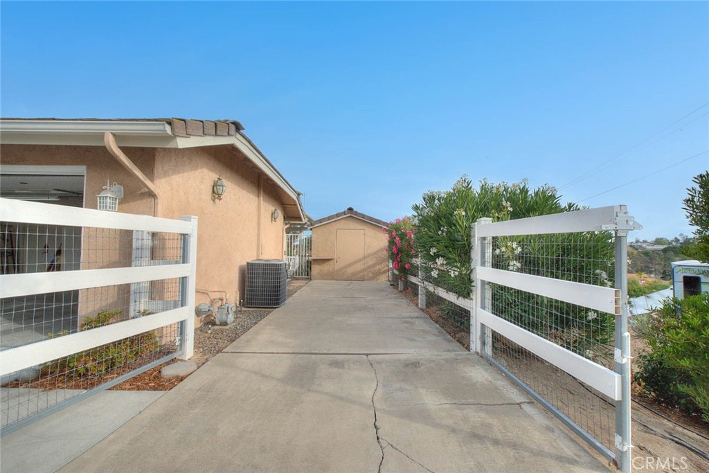 30673 Del Rey Road Temecula, CA 92591 - Photo 39 of 47 Next To Garage Is Space For RV. Shed At Rear Offers Even More Storage Space And Has Electrical Power.