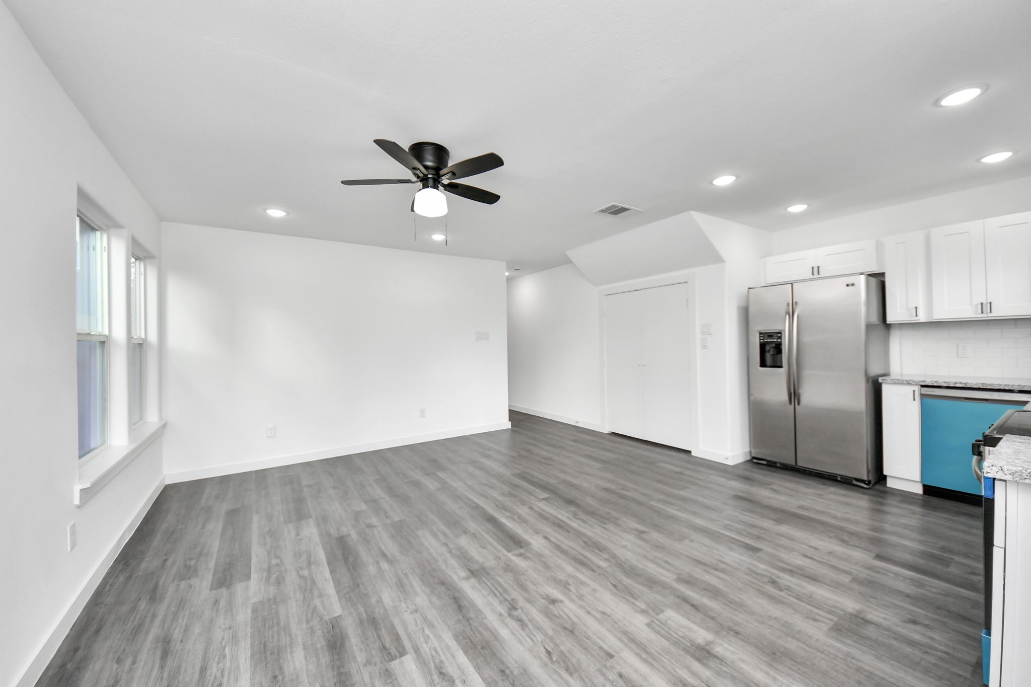2310 Wavell Street, Unit B Houston, TX 77088 - Photo 15 of 37 a view of a kitchen with a sink and a refrigerator