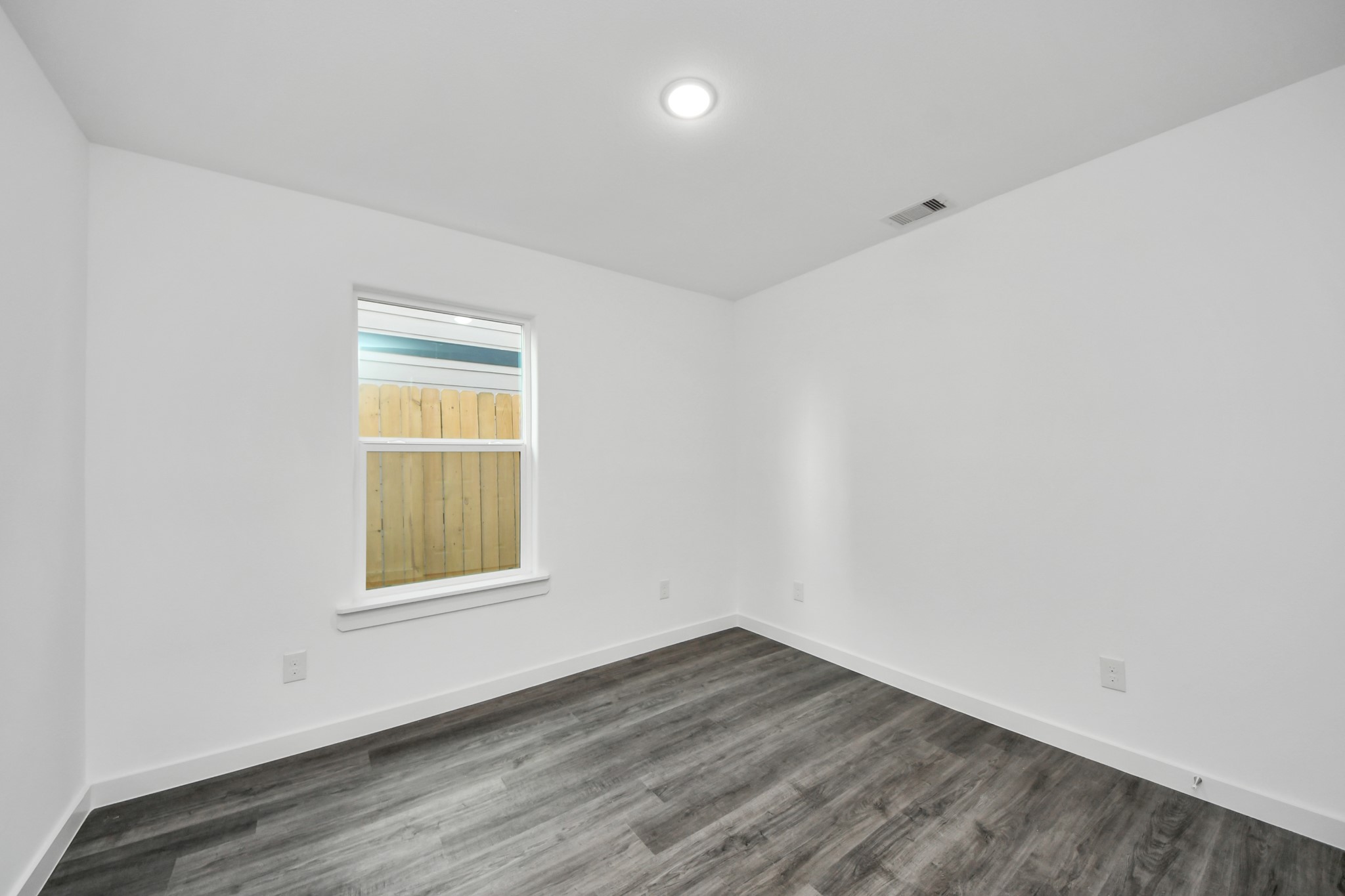 2310 Wavell Street, Unit B Houston, TX 77088 - Photo 18 of 37 an empty room with a window