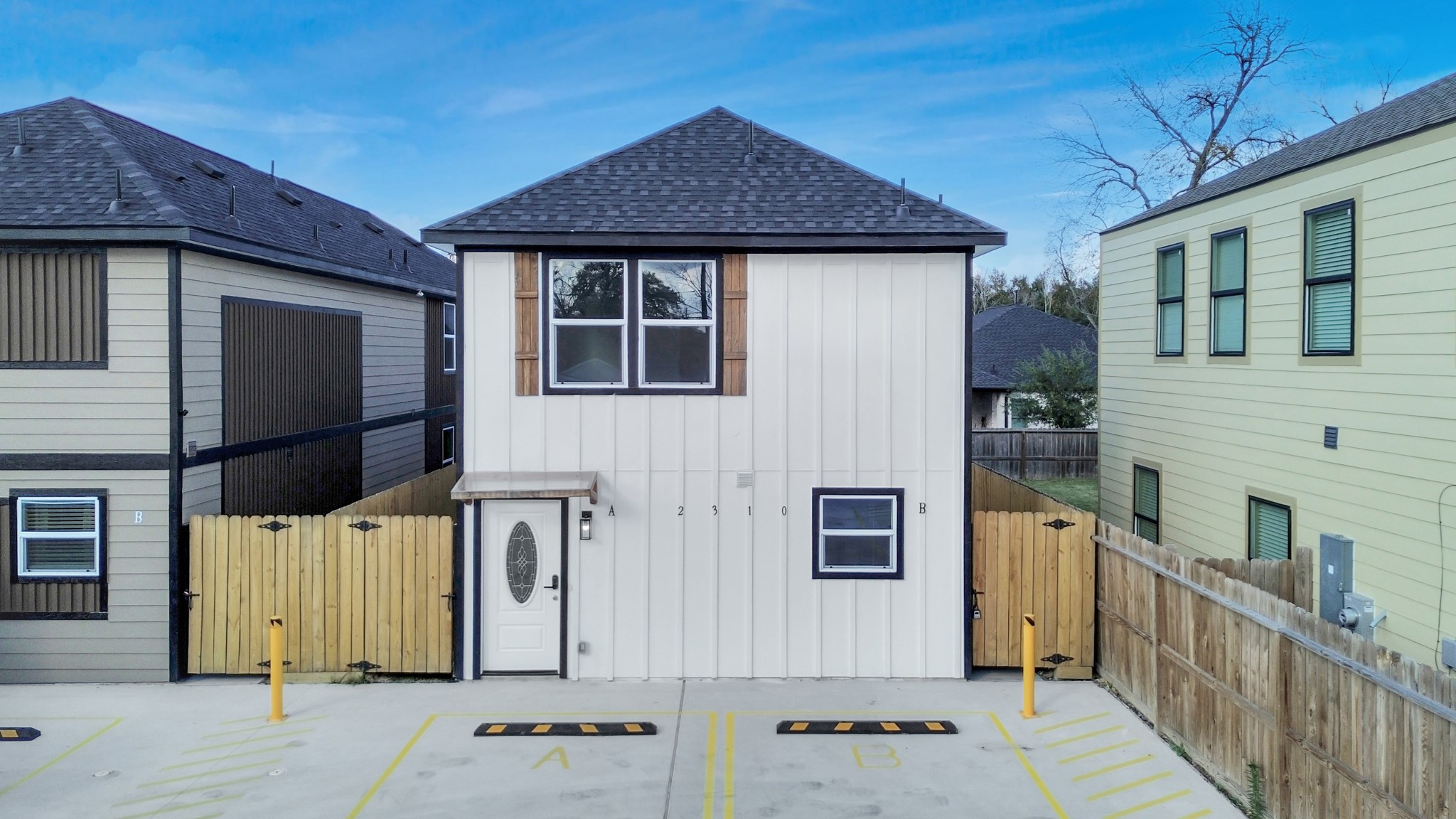 2310 Wavell Street, Unit B Houston, TX 77088 - Photo 3 of 37 a front view of a house with parking