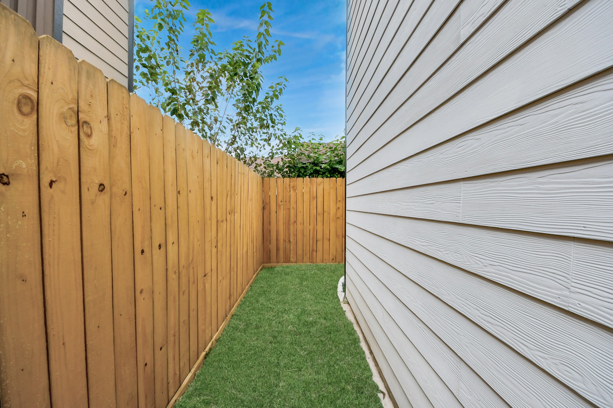 2310 Wavell Street, Unit B Houston, TX 77088 - Photo 31 of 37 a view of a pathway with a balcony