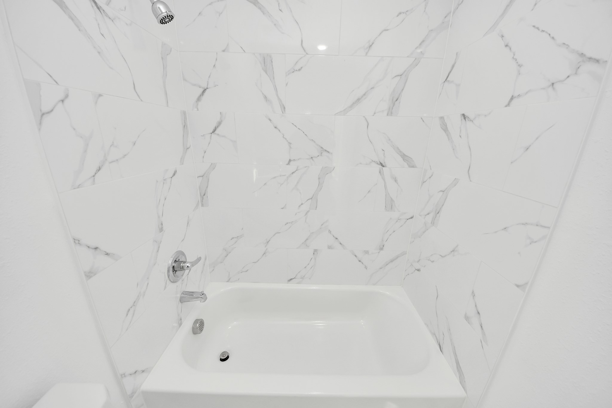 2310 Wavell Street, Unit B Houston, TX 77088 - Photo 33 of 37 a close up of a bathtub