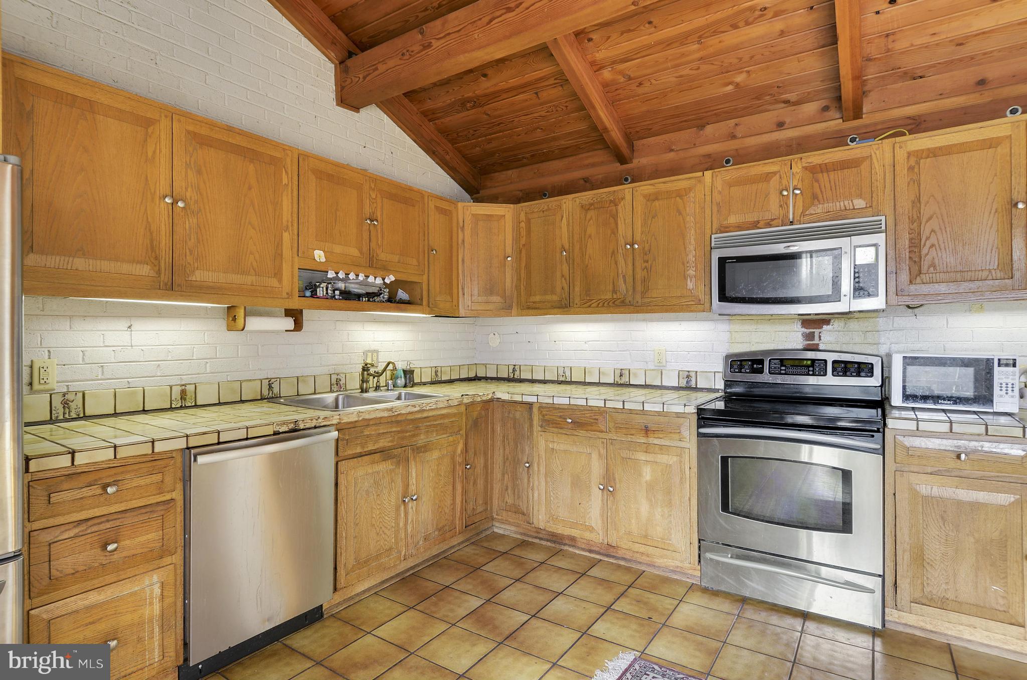 9704 Elrod Road Kensington, MD 20895 - Photo 7 of 30 Kitchen with Stainless Steel Appliance