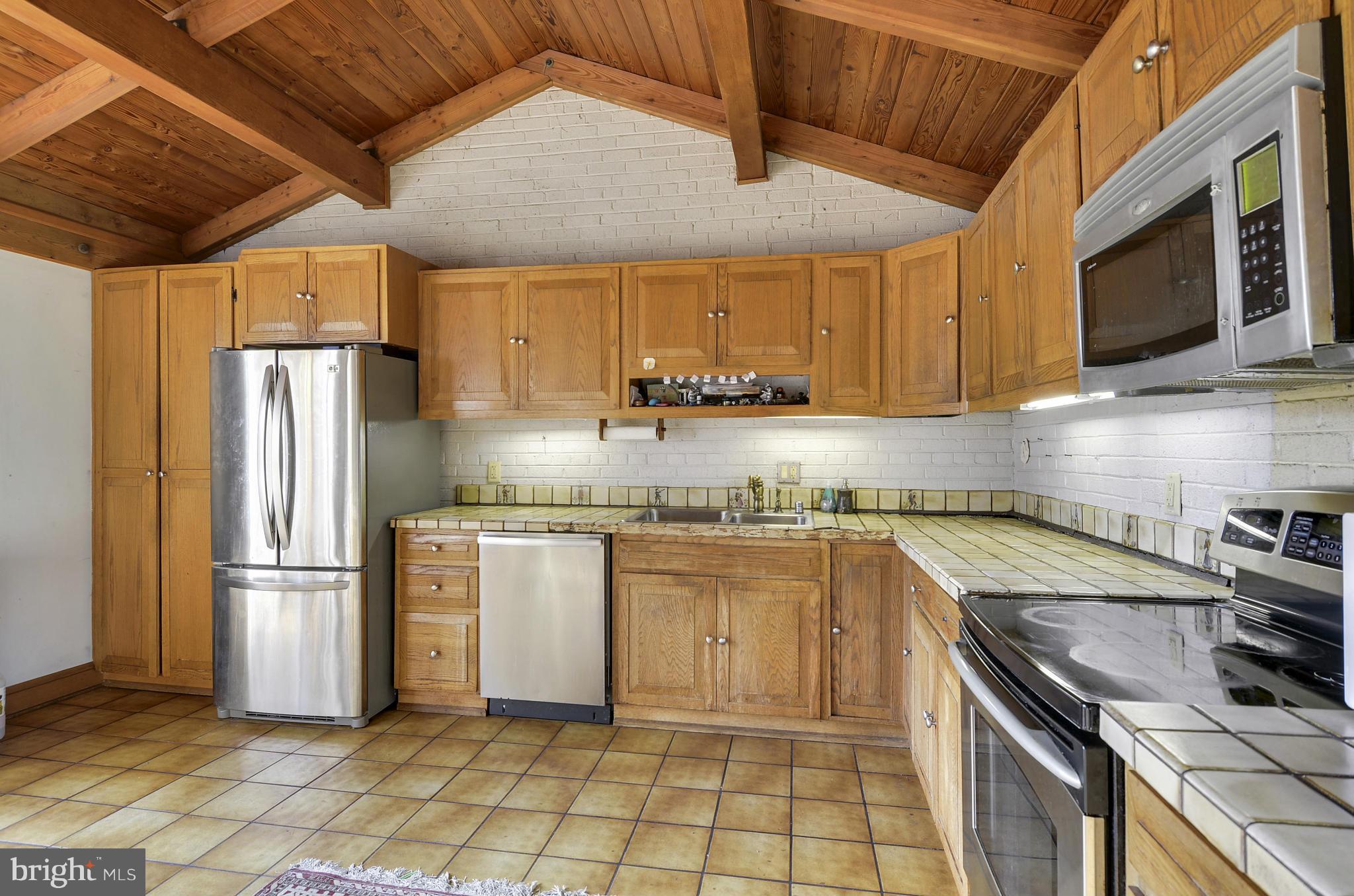 9704 Elrod Road Kensington, MD 20895 - Photo 8 of 30 Large Kitchen with Pitched Wood Ceilings