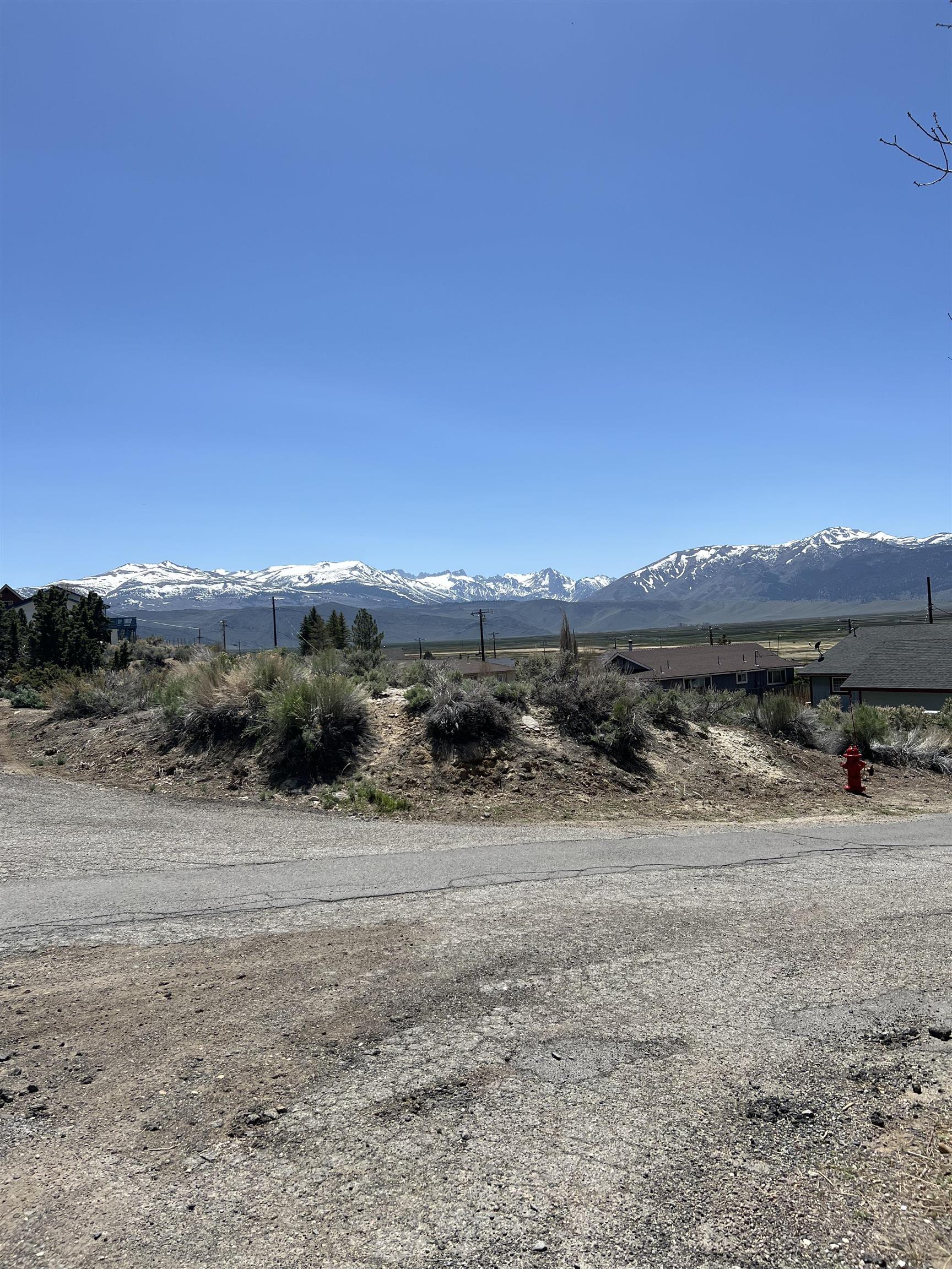 7 Rickey Peak Road, Unit 7 Bridgeport, CA 93517 - Photo 4 of 6 a view of a dirt road and a building