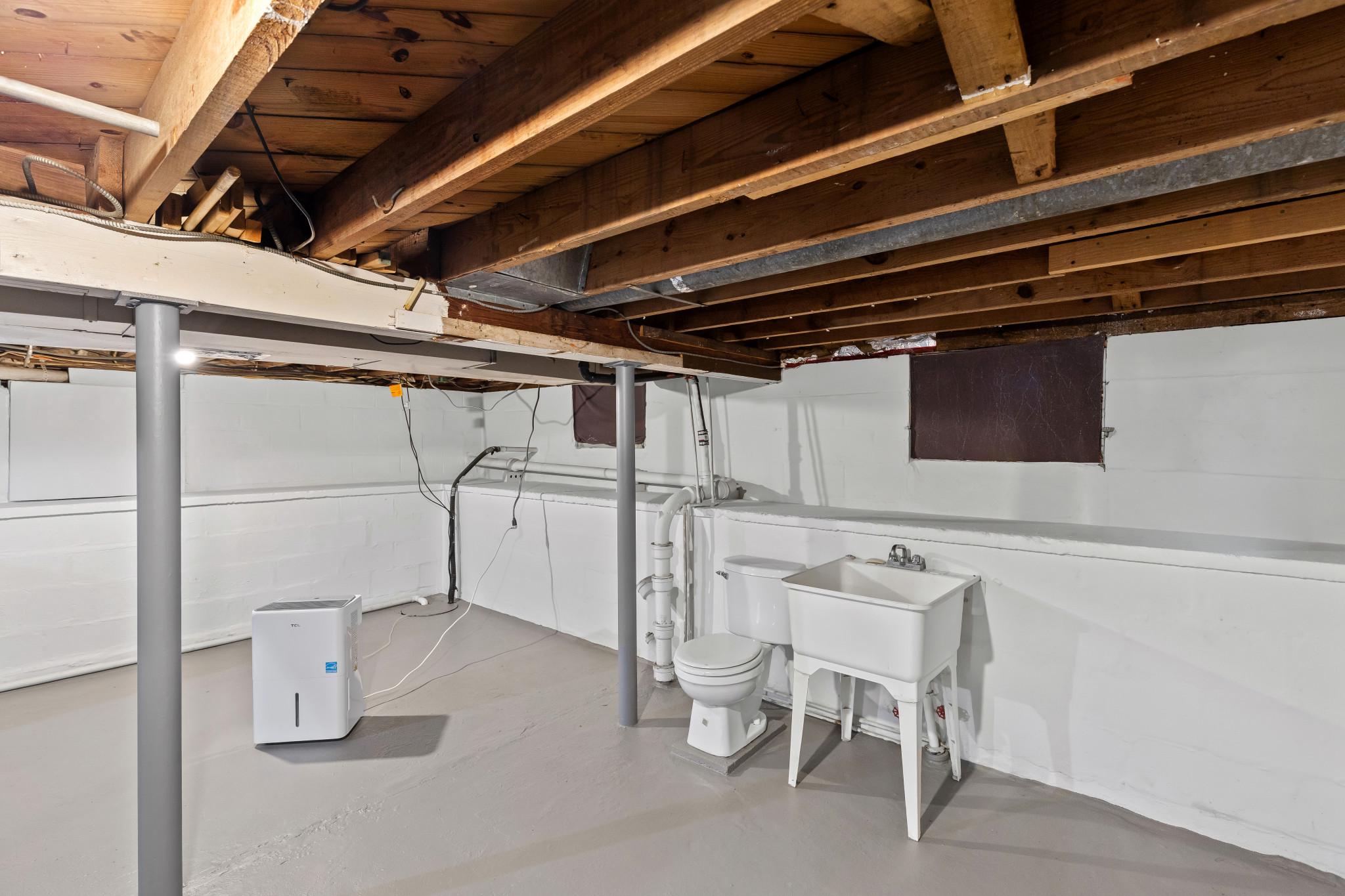 7508 Riddle Avenue Baltimore, MD 21224 - Photo 20 of 25 Lower level plumbed for your new bath