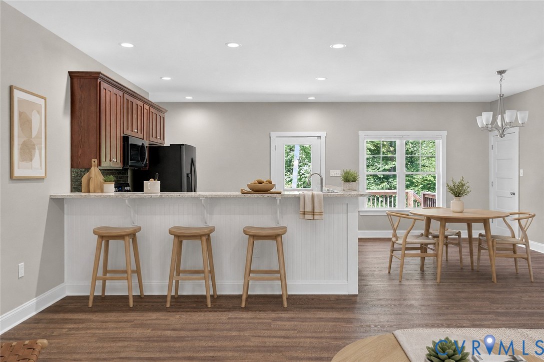 3834 Three Chopt Road Gum Spring, VA 23065 - Photo 6 of 56 Kitchen featuring a breakfast bar with beadboard p