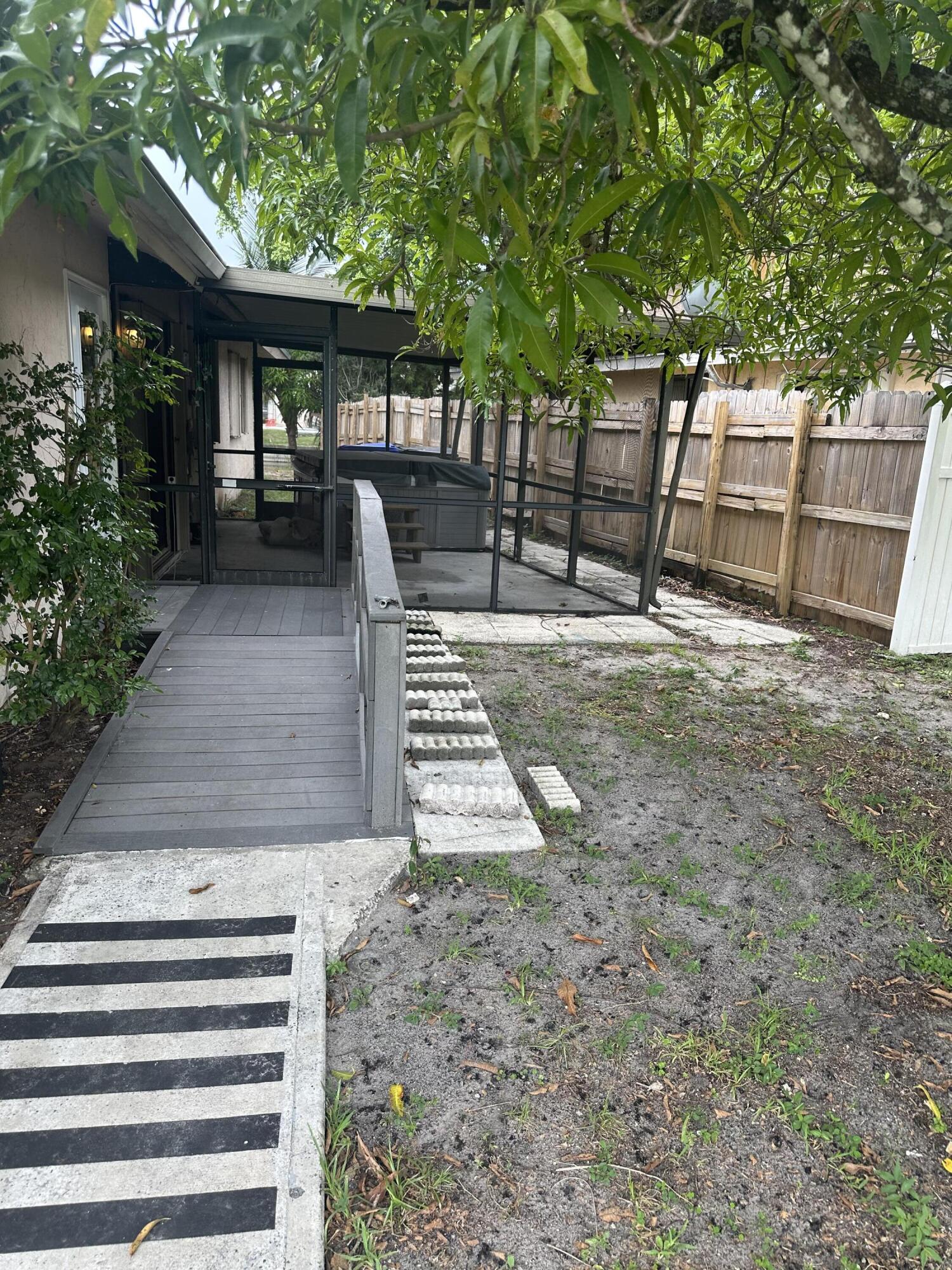 6504 Harbour Road North Lauderdale, FL 33068 - Photo 13 of 15 a view of a backyard with sitting area