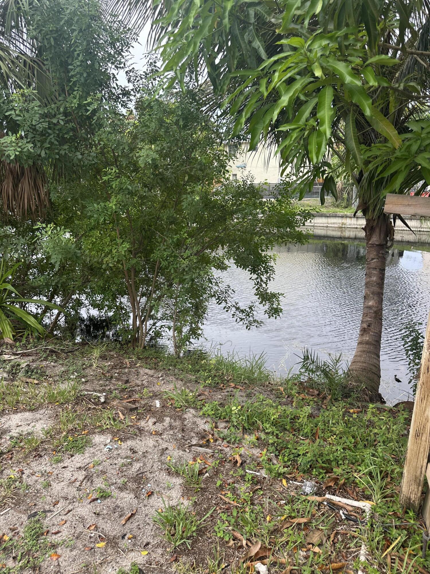 6504 Harbour Road North Lauderdale, FL 33068 - Photo 15 of 15 a view of a lake with top of house