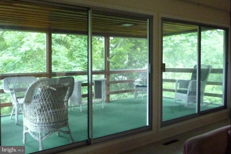 6202 Ivymount Road Baltimore, MD 21209 - Photo 11 of 30 Screen porch off lliving/dining room