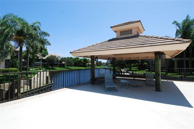 3911 Back Bay Drive, Unit 123 Jupiter, FL 33477 - Photo 40 of 61 WY pool area and lake