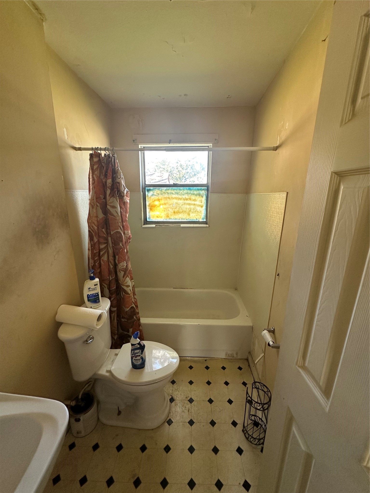 1314 Bland Street Houston, TX 77091 - Photo 2 of 8 a bathroom with a sink toilet and shower