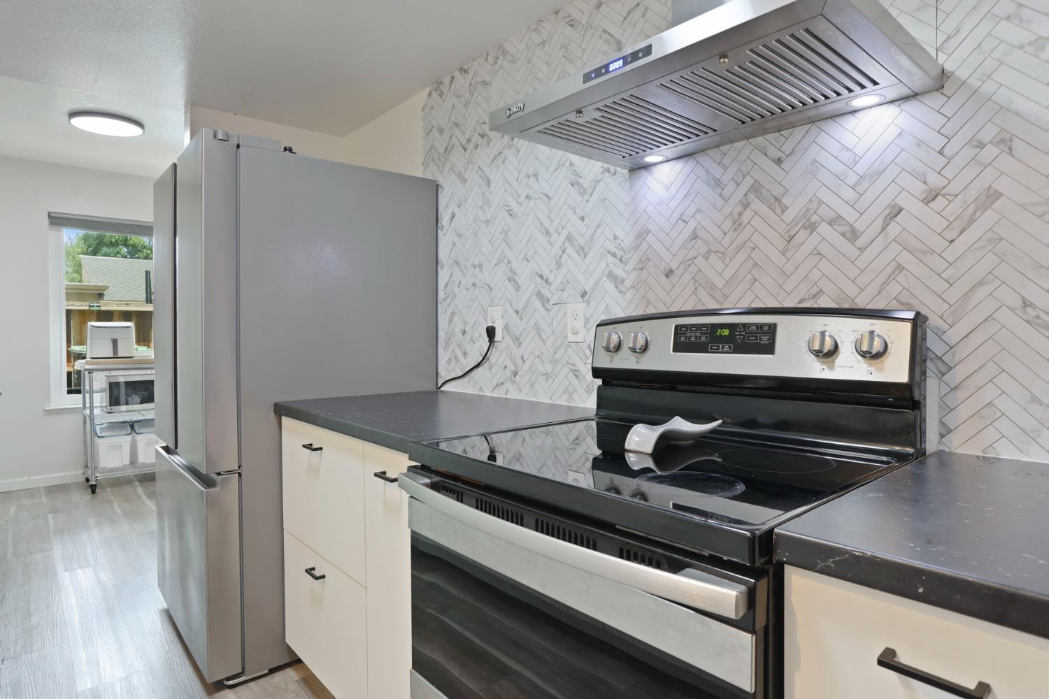 3623 Appleton Way Stockton, CA 95219 - Photo 9 of 34 hood over range