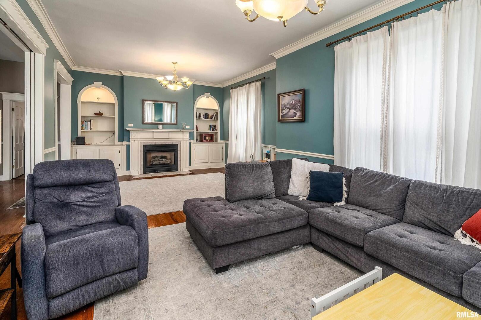 2101 Walnut Street Murphysboro, IL 62966 - Photo 11 of 55 a living room with furniture and a fireplace