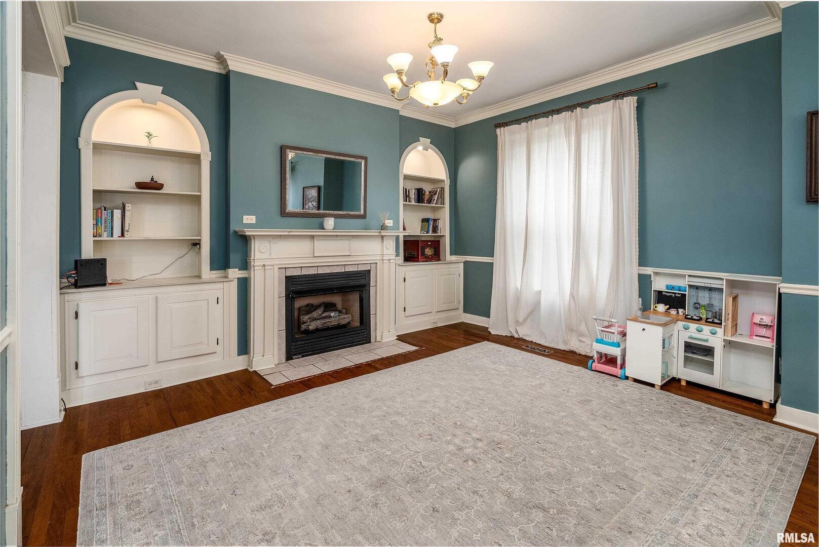 2101 Walnut Street Murphysboro, IL 62966 - Photo 12 of 55 a living room with furniture and a fireplace