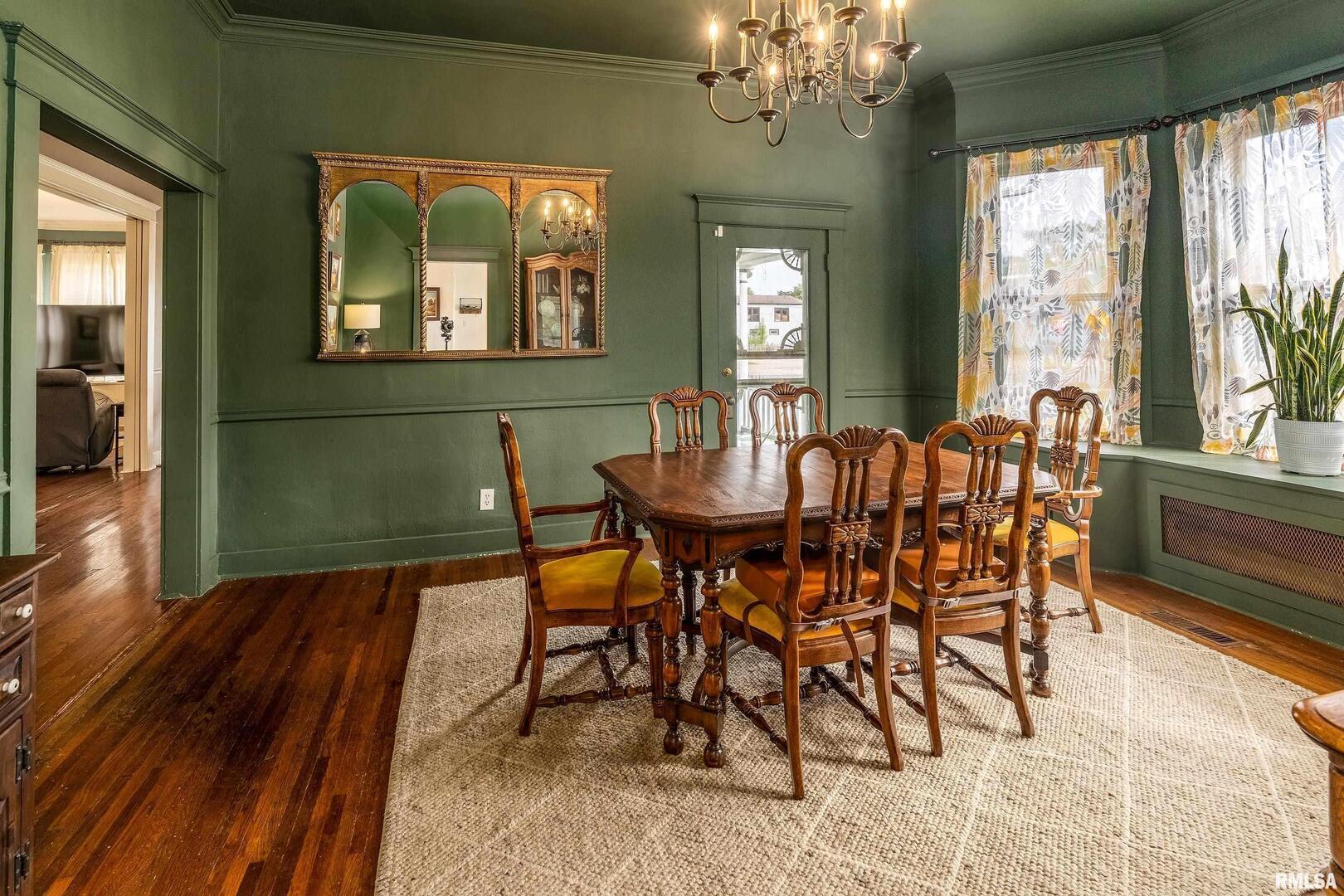 2101 Walnut Street Murphysboro, IL 62966 - Photo 13 of 55 a dining room with furniture a livingroom and chandelier