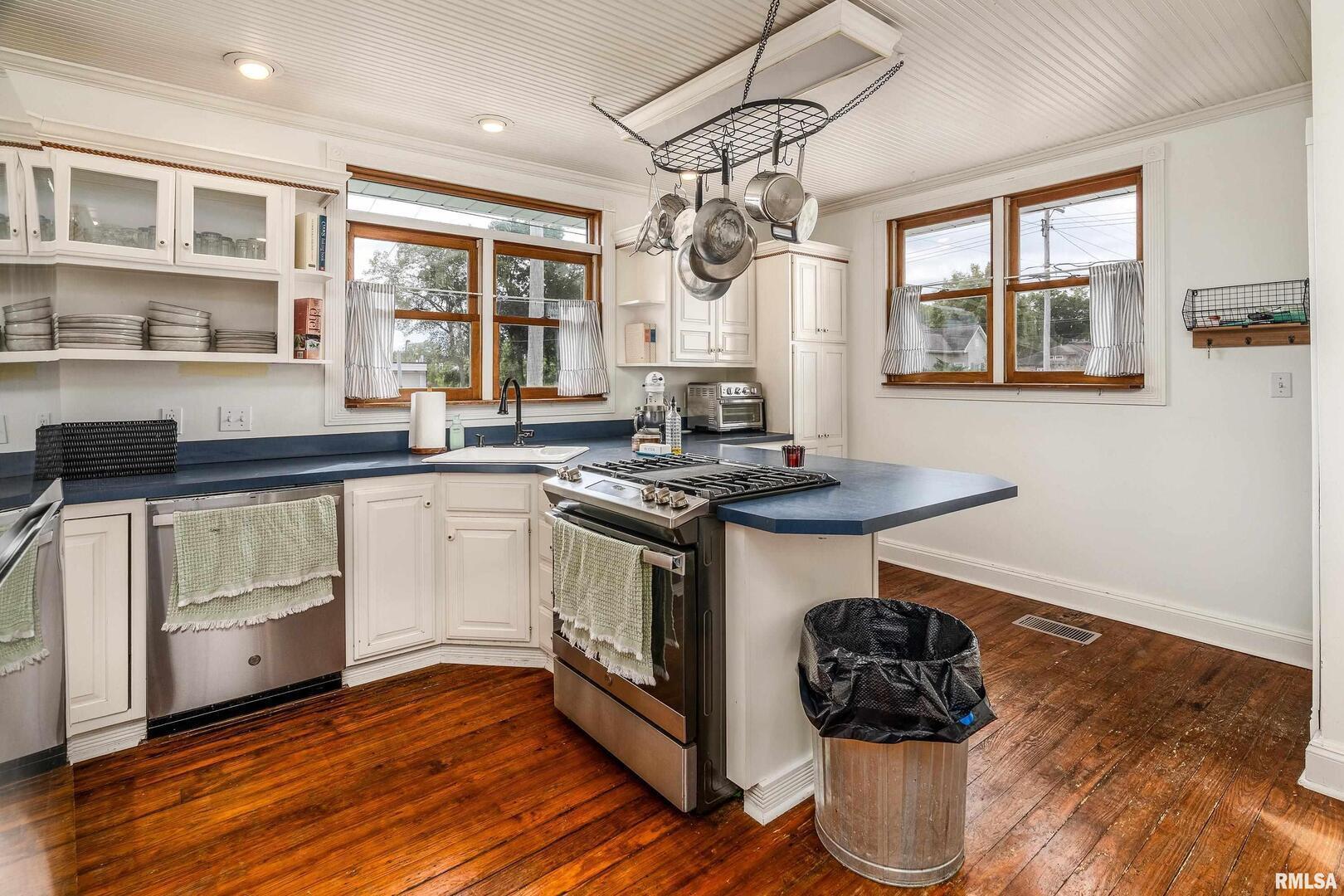 2101 Walnut Street Murphysboro, IL 62966 - Photo 15 of 55 a kitchen with stainless steel appliances granite countertop a stove and a sink