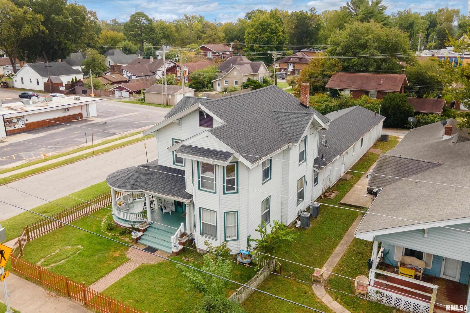 2101 Walnut Street Murphysboro, IL 62966 - Photo 52 of 55 an aerial view of residential houses with yard and swimming pool