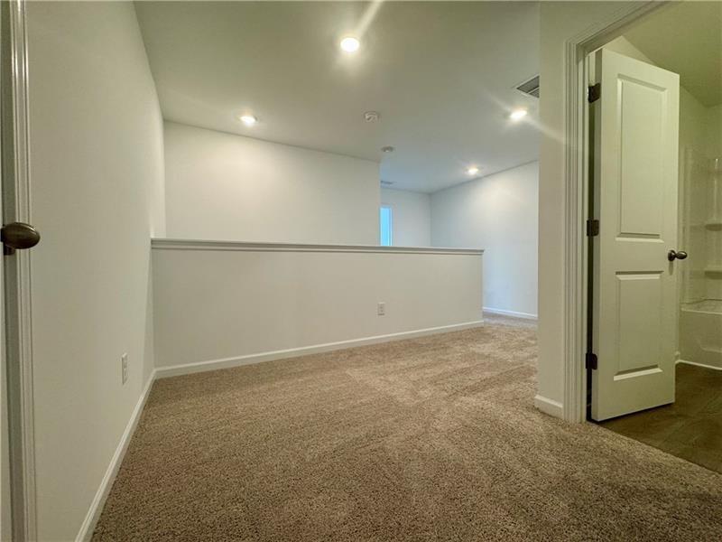 5309 Frontier Court Flowery Branch, GA 30542 - Photo 19 of 30 a view of an empty room