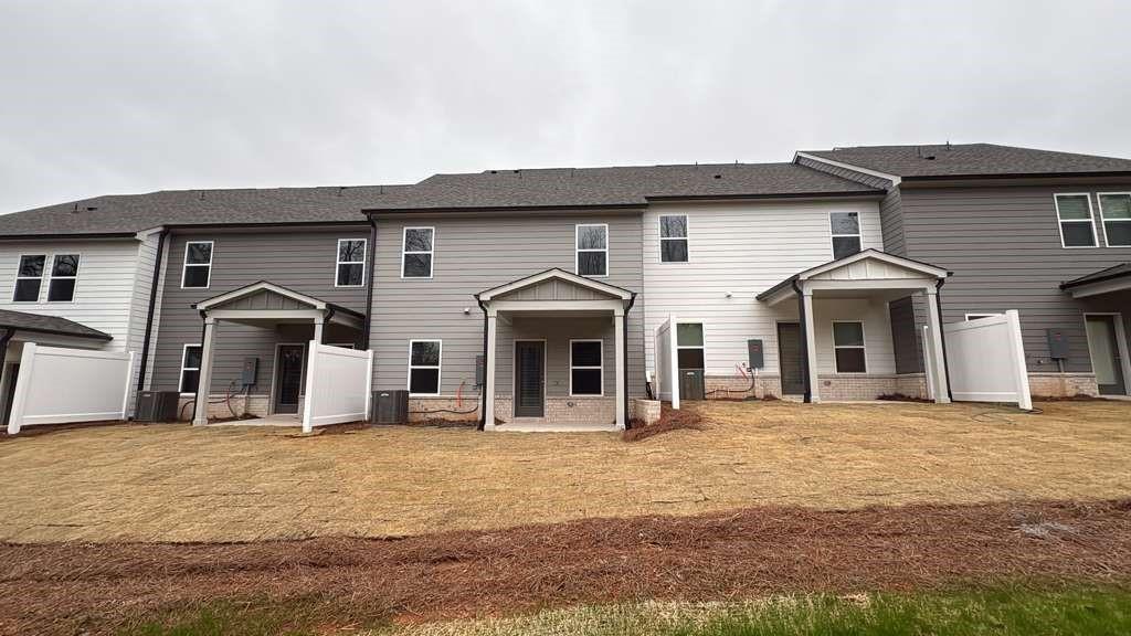 5309 Frontier Court Flowery Branch, GA 30542 - Photo 22 of 30 a front view of a house with glass windows