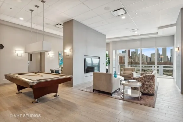 a very nice looking kitchen with a large window