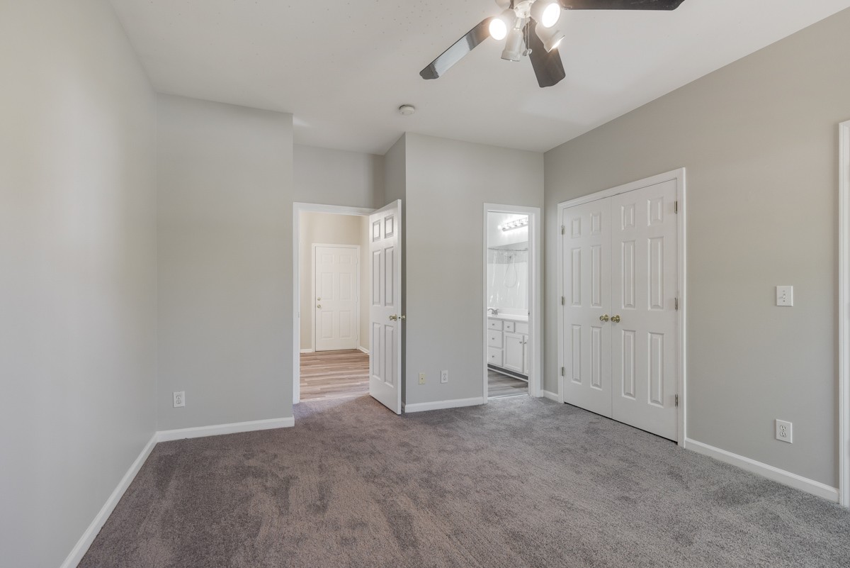 900 Dove Ridge Circle Nashville, TN 37221 - Photo 13 of 24 a view of an empty room and chandelier fan