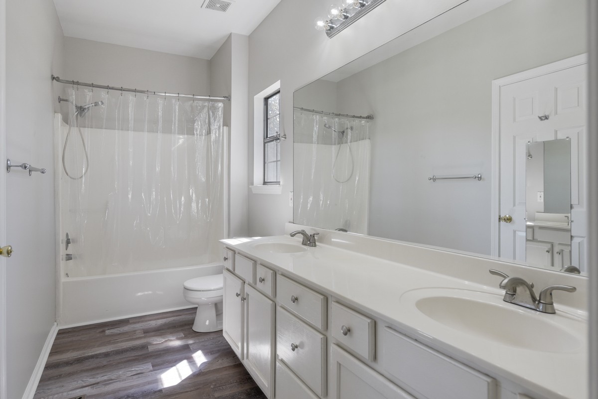 900 Dove Ridge Circle Nashville, TN 37221 - Photo 14 of 24 a bathroom with a sink a toilet and shower