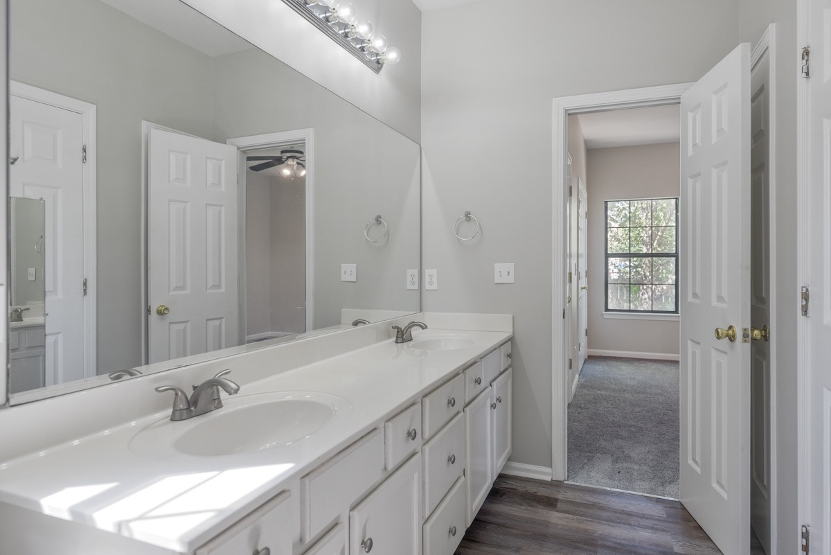 900 Dove Ridge Circle Nashville, TN 37221 - Photo 15 of 24 a bathroom with double vanity sinks and a mirror