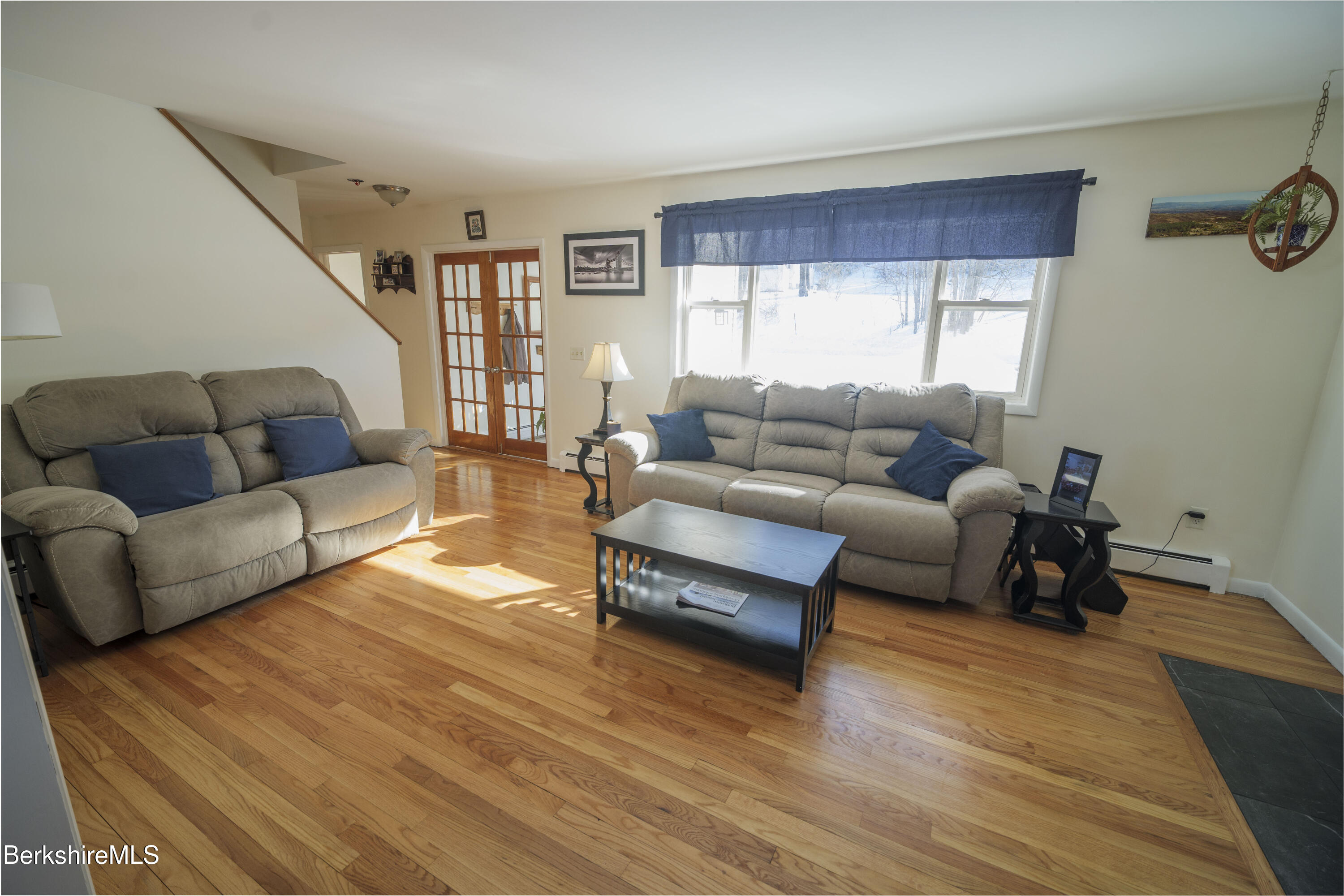 582 East New Lenox Road Pittsfield, MA 01201 - Photo 3 of 23 a living room with furniture and a wooden floor
