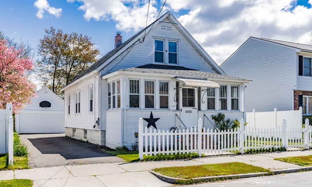149 Eddy Street Springfield, MA 01104 - Photo 2 of 42 a front view of a house with a garden