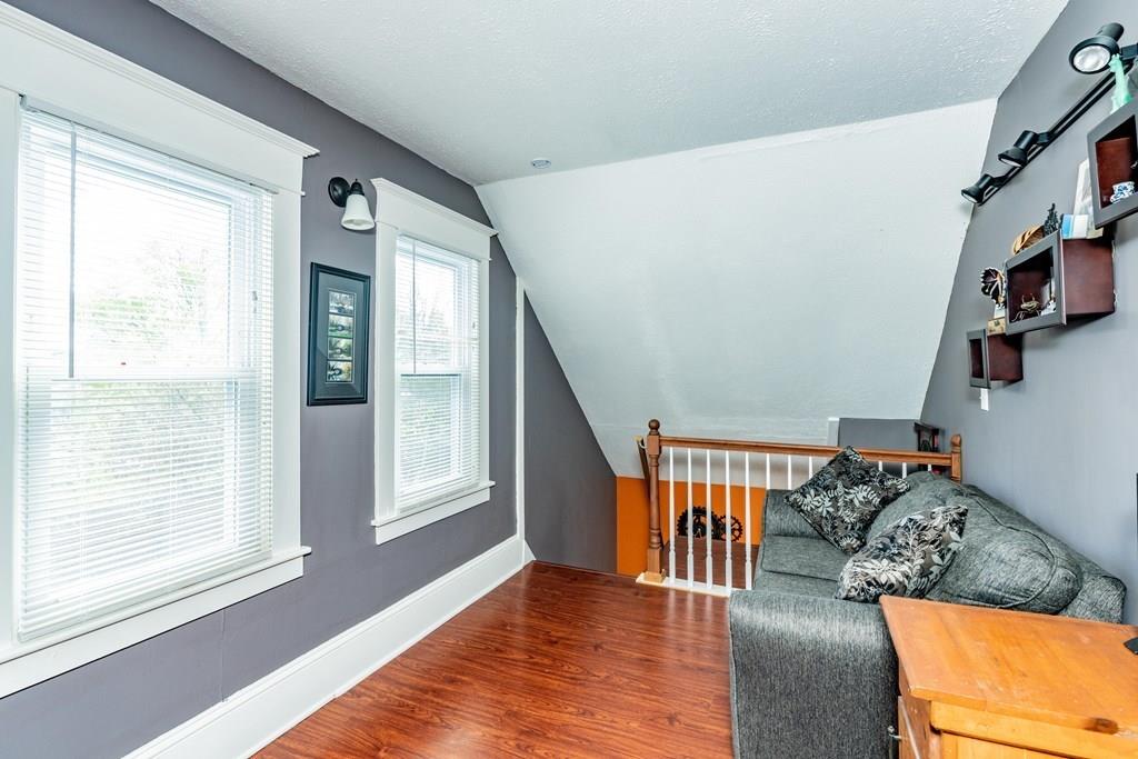 149 Eddy Street Springfield, MA 01104 - Photo 23 of 42 a view of livingroom with furniture and a window