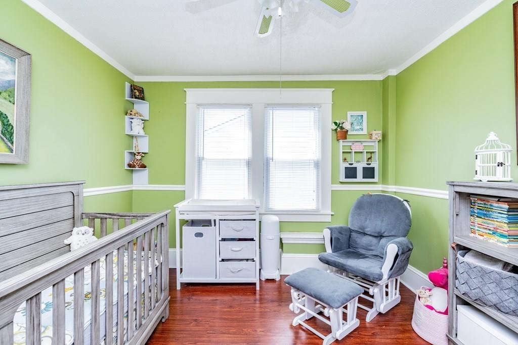 149 Eddy Street Springfield, MA 01104 - Photo 25 of 42 a room with furniture and a window