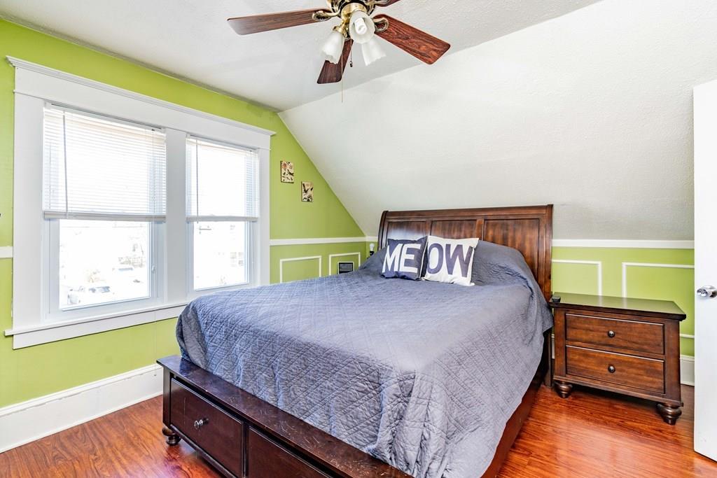 149 Eddy Street Springfield, MA 01104 - Photo 29 of 42 a bedroom with a bed and a window