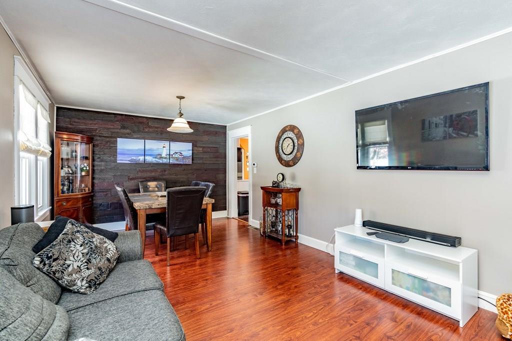 149 Eddy Street Springfield, MA 01104 - Photo 4 of 42 a living room with furniture and a flat screen tv